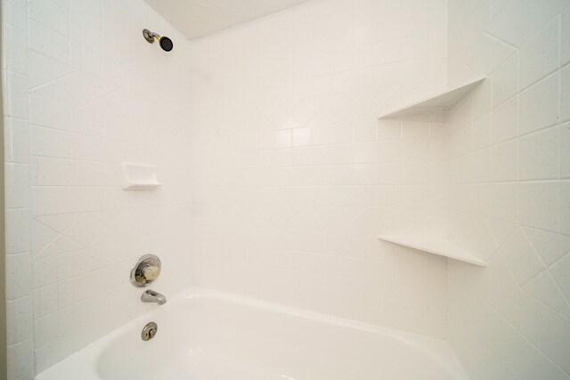 bathroom with shower / bathing tub combination