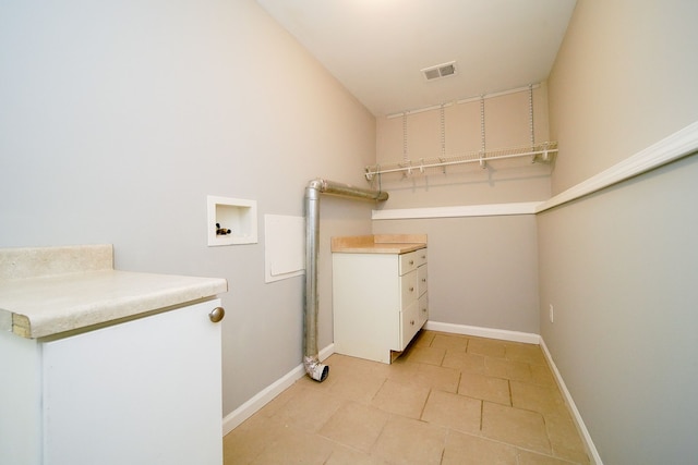 laundry area featuring cabinets and washer hookup