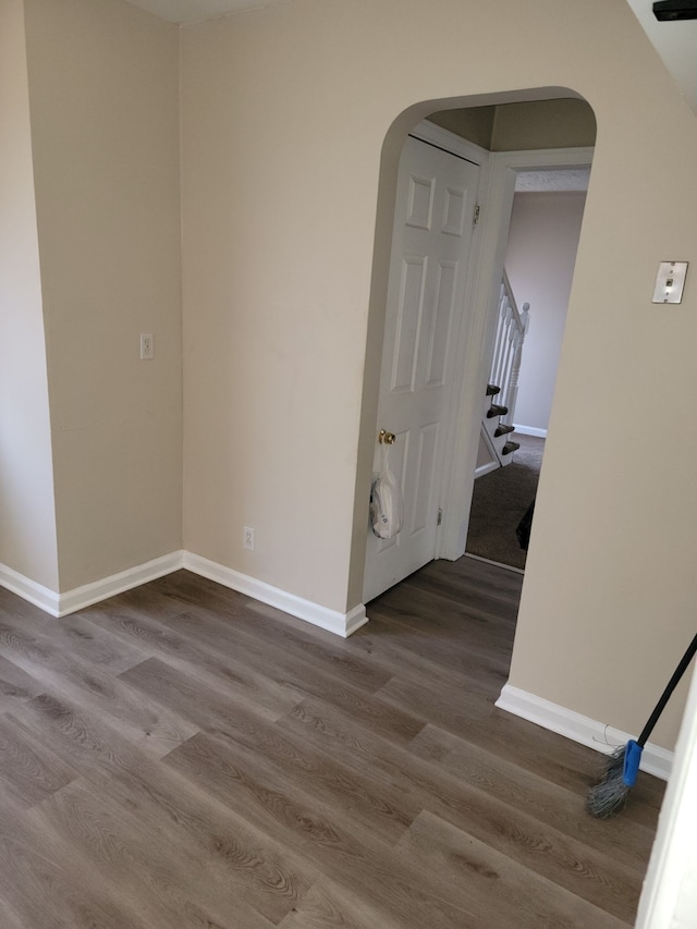 unfurnished room featuring wood-type flooring