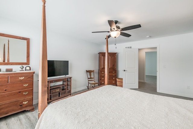 bedroom featuring ceiling fan and light hardwood / wood-style floors