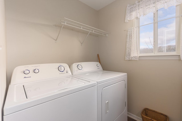 laundry room featuring independent washer and dryer