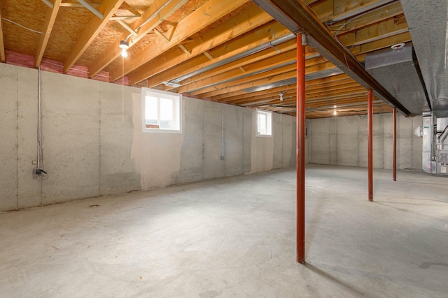 basement featuring heating unit