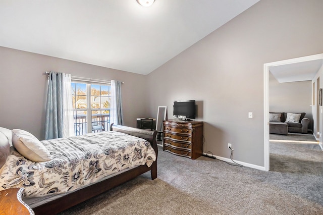 carpeted bedroom with vaulted ceiling