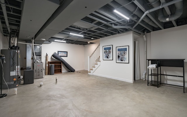 basement featuring gas water heater