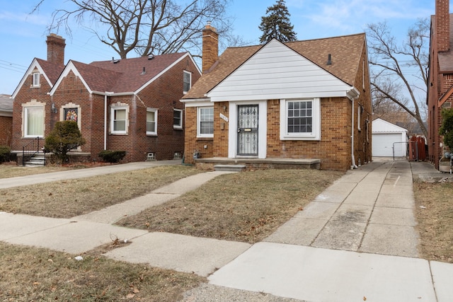 view of front of house featuring an outbuilding and a garage