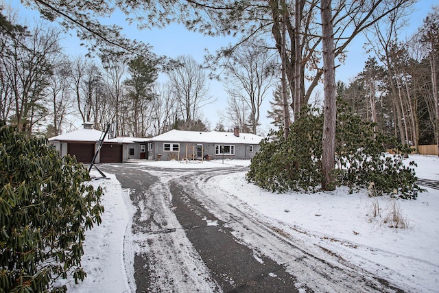 ranch-style home with a garage