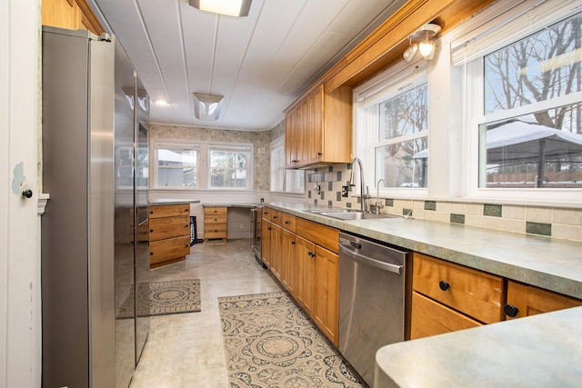 kitchen with appliances with stainless steel finishes and sink