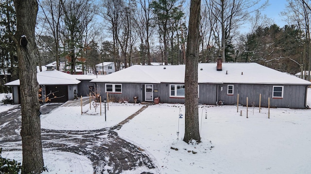 view of snow covered house