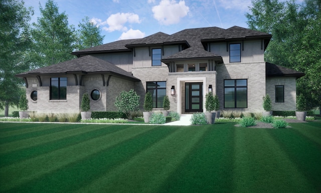 prairie-style home featuring a front lawn