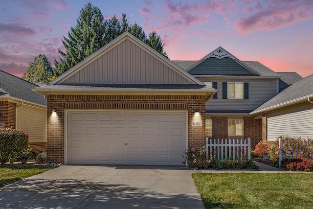 view of front of home with a garage