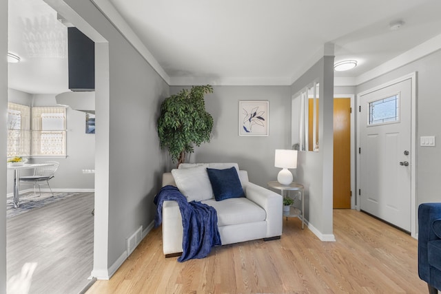 living area featuring light hardwood / wood-style floors