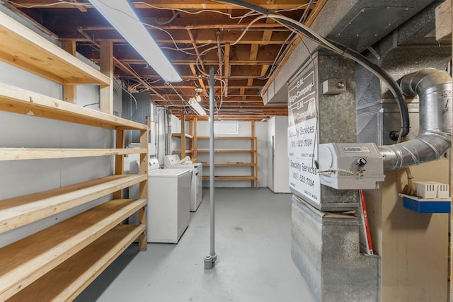 basement featuring washing machine and dryer