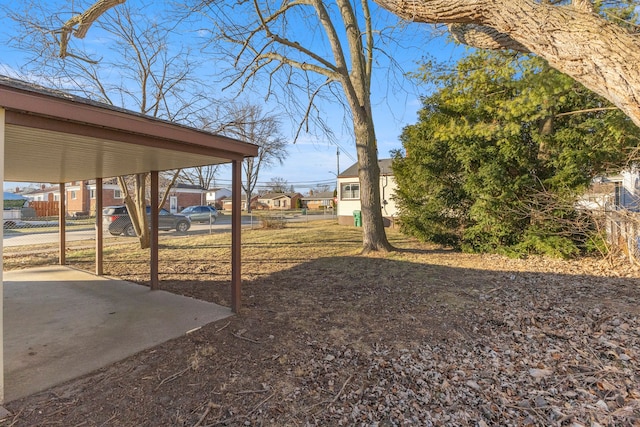 view of yard featuring a carport