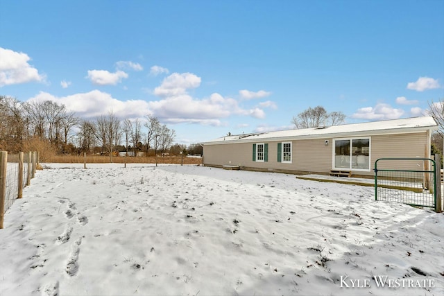 view of snow covered property