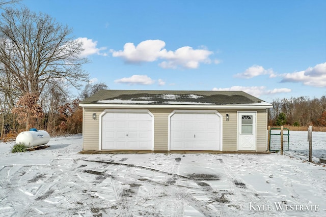 view of snow covered garage