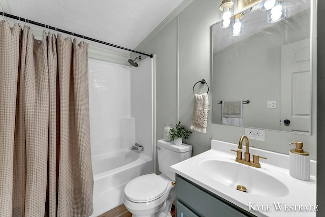 full bathroom with vanity, a textured ceiling, shower / tub combo with curtain, and toilet