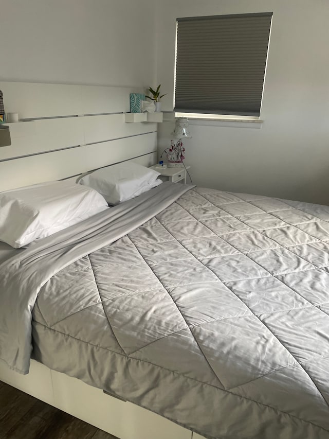 bedroom featuring hardwood / wood-style floors