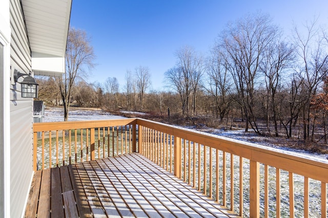 view of snow covered deck