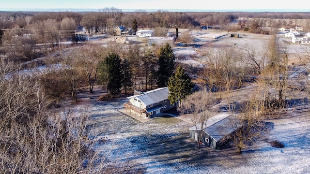 birds eye view of property with a rural view