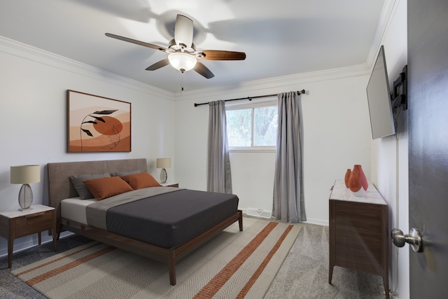 bedroom featuring ceiling fan, light colored carpet, and crown molding