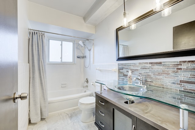 full bathroom with vanity, toilet, shower / bathtub combination with curtain, and tile walls