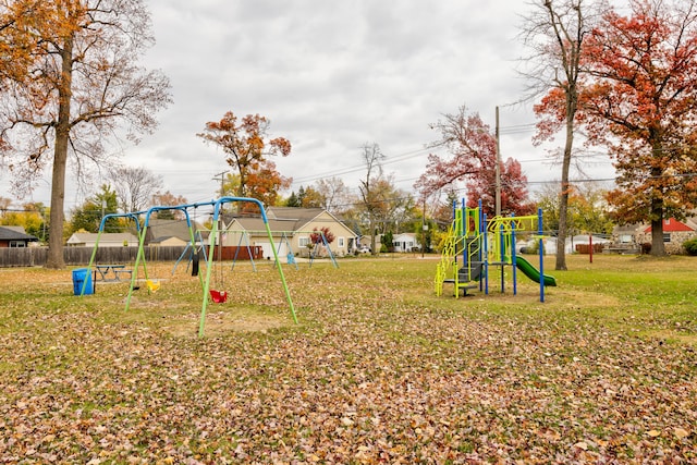 view of playground featuring a lawn