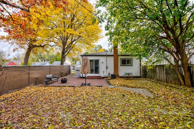 rear view of house featuring a patio area