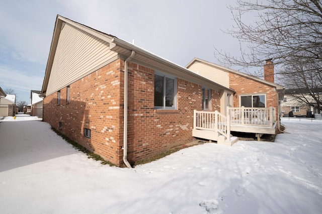 view of snow covered property