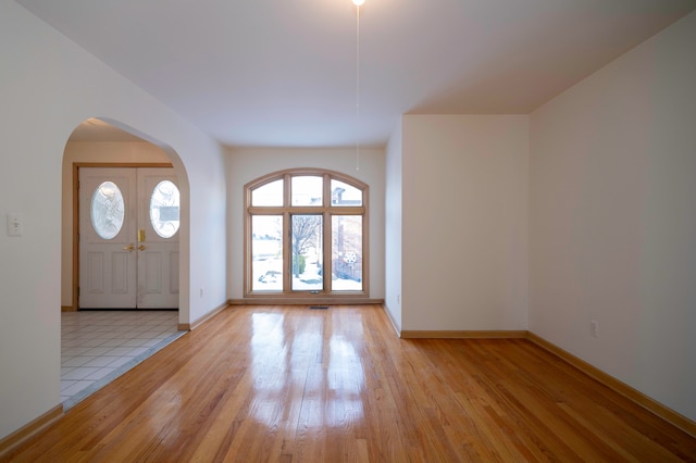 foyer with light hardwood / wood-style flooring