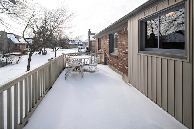 view of snow covered patio