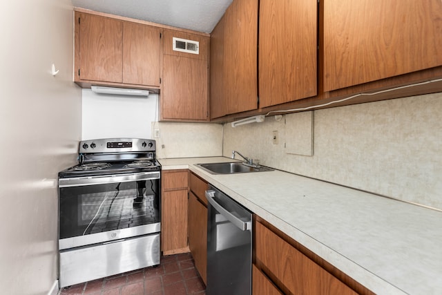 kitchen featuring appliances with stainless steel finishes and sink