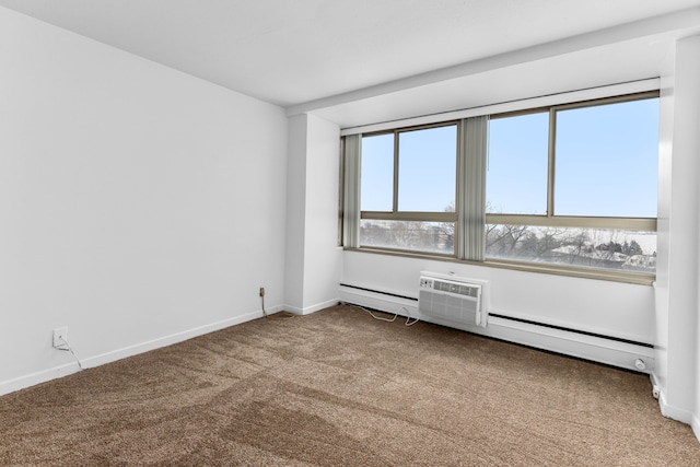 carpeted empty room featuring a baseboard radiator