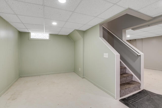 basement featuring a paneled ceiling