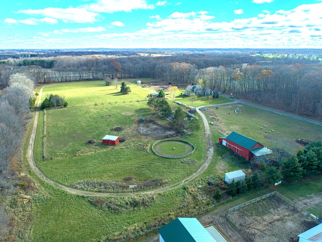 birds eye view of property featuring a rural view