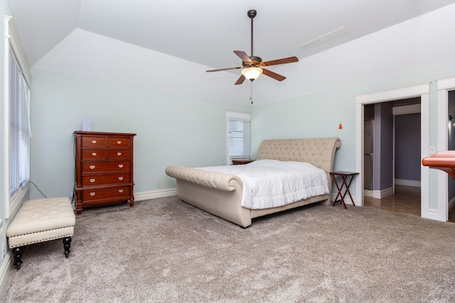 carpeted bedroom featuring ceiling fan and lofted ceiling