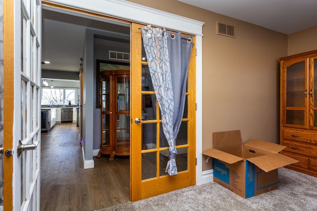 office space with french doors and carpet floors