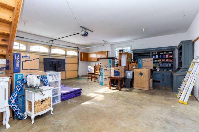 garage featuring a garage door opener