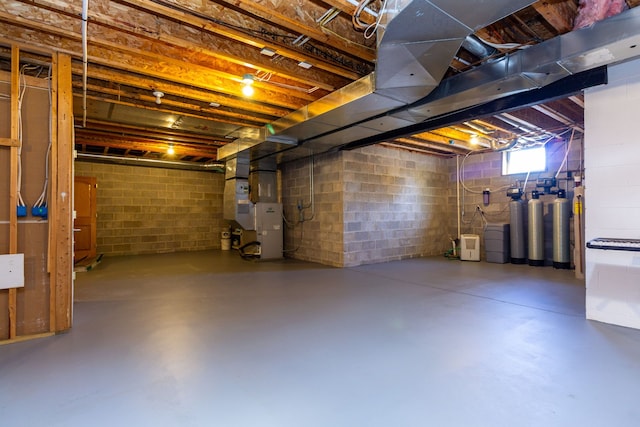 basement featuring heating unit