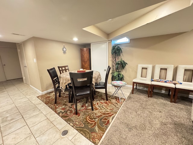 view of carpeted dining space