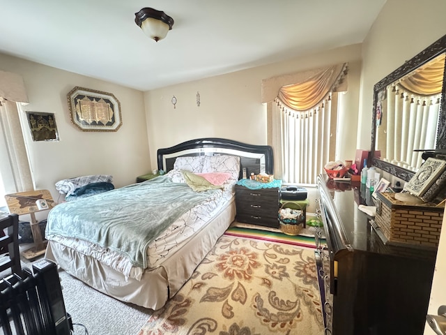 bedroom featuring carpet