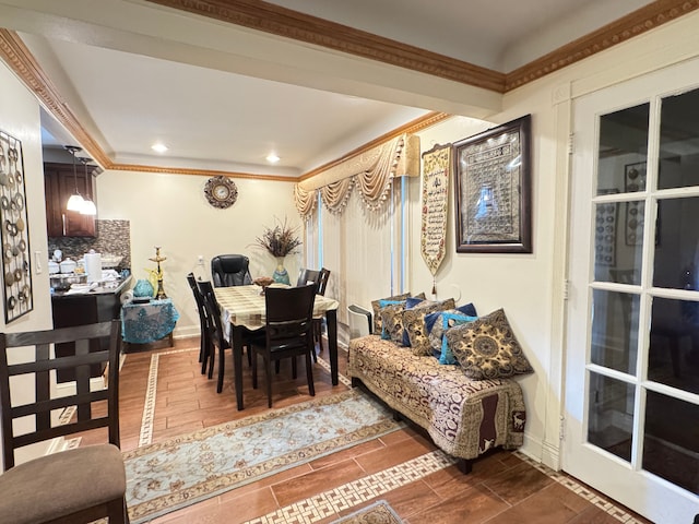 dining room with crown molding