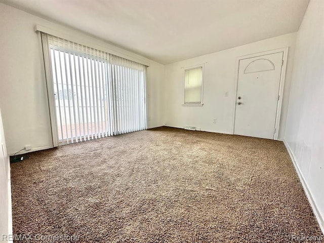 view of carpeted spare room