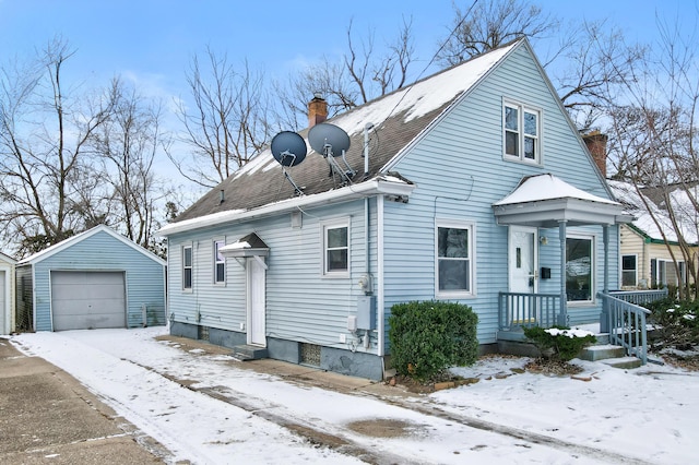 front of property featuring an outbuilding and a garage