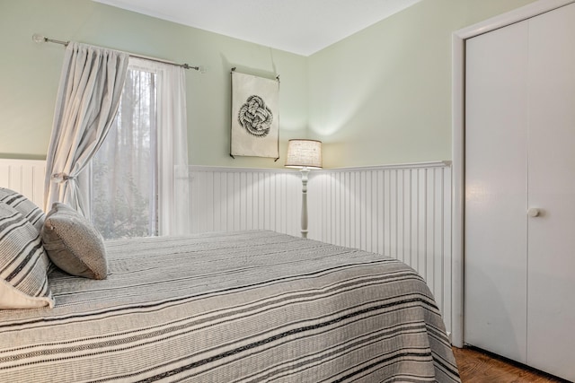 bedroom featuring a closet and hardwood / wood-style floors