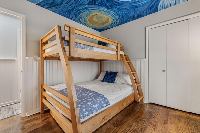 bedroom featuring dark hardwood / wood-style flooring