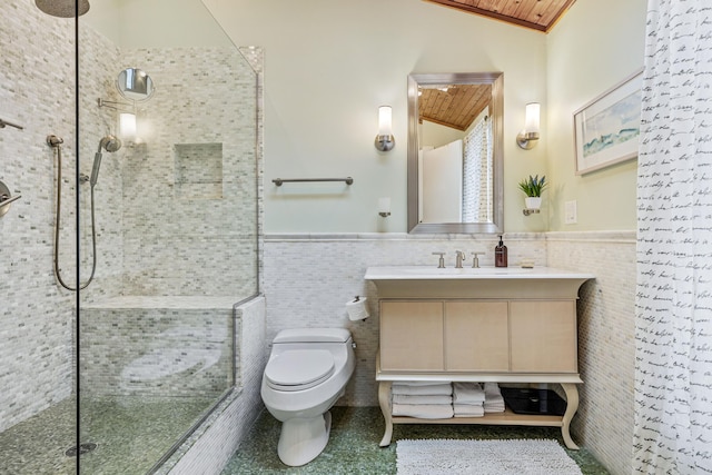 bathroom with lofted ceiling, wooden ceiling, toilet, tile walls, and a tile shower