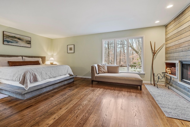 bedroom with hardwood / wood-style floors