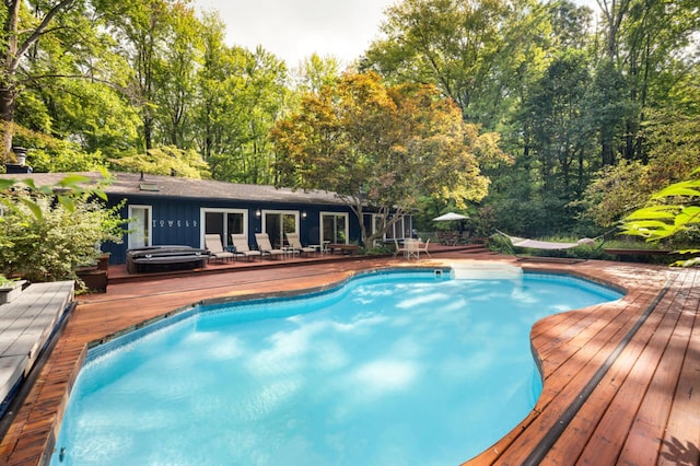 view of pool with a deck