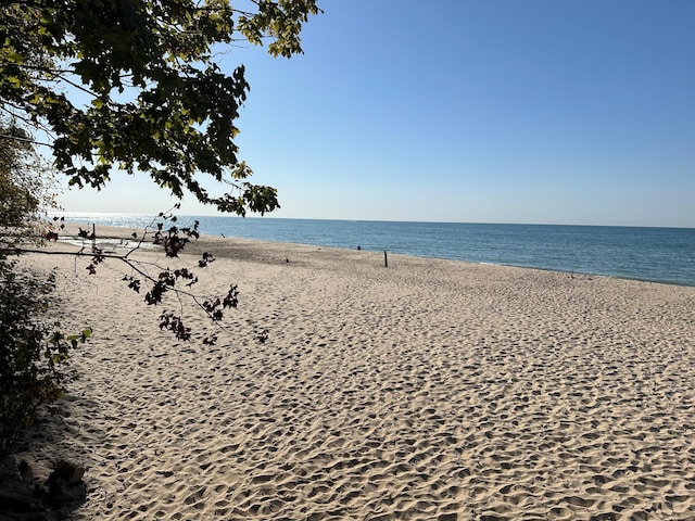 property view of water with a beach view