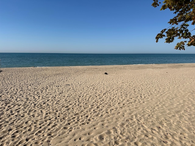 view of water feature featuring a beach view